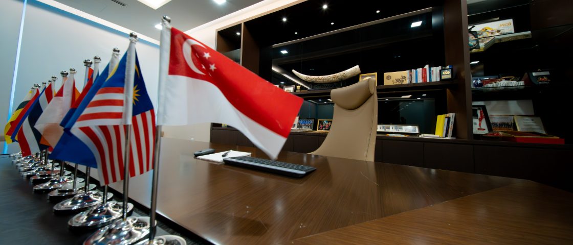 ASEAN flags along a YCH boardroom table